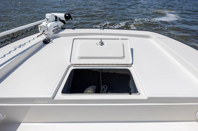  Yacht Photos Pics Calcutta 263 boat deck with open hatch and trolling motor, 2023 model.