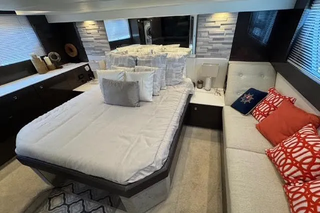  Yacht Photos Pics Luxurious bedroom interior of 2019 Cruisers Yachts 50 Cantius with modern decor.