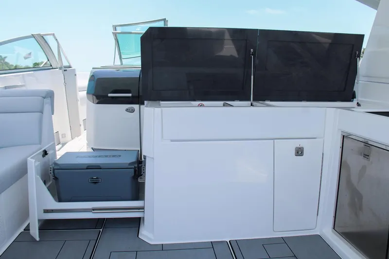  Yacht Photos Pics 2023 Aviara AV40 OB boat interior with sleek cabinetry and storage compartments.