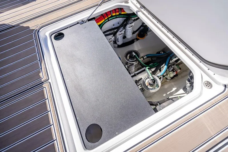  Yacht Photos Pics 2023 Nor-Tech 500 Sport engine compartment with visible wiring and components.