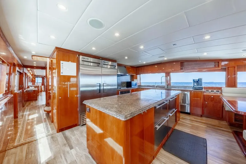  Yacht Photos Pics Luxurious 2009 Hargrave Raised Pilothouse yacht kitchen with modern appliances and ocean view.