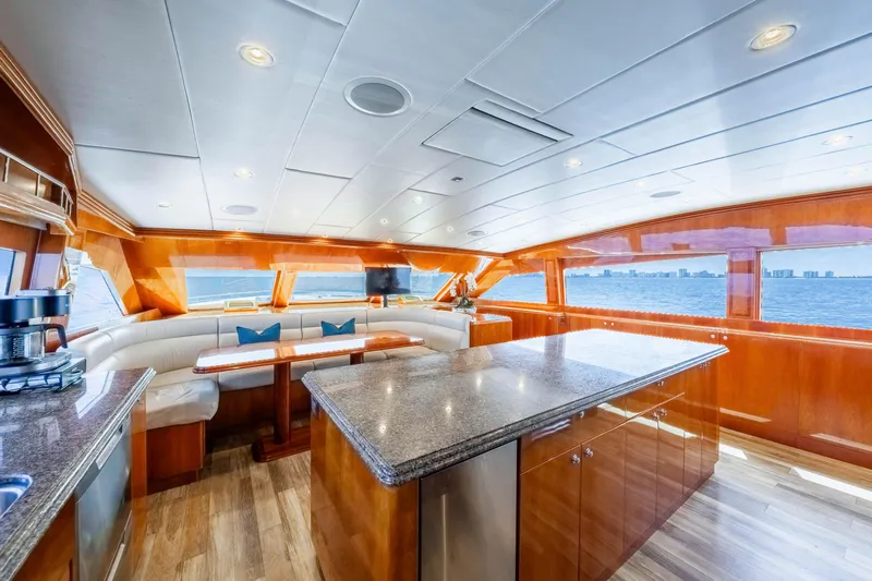  Yacht Photos Pics Luxurious 2009 Hargrave Raised Pilothouse yacht interior with elegant wood finishes and ocean view.