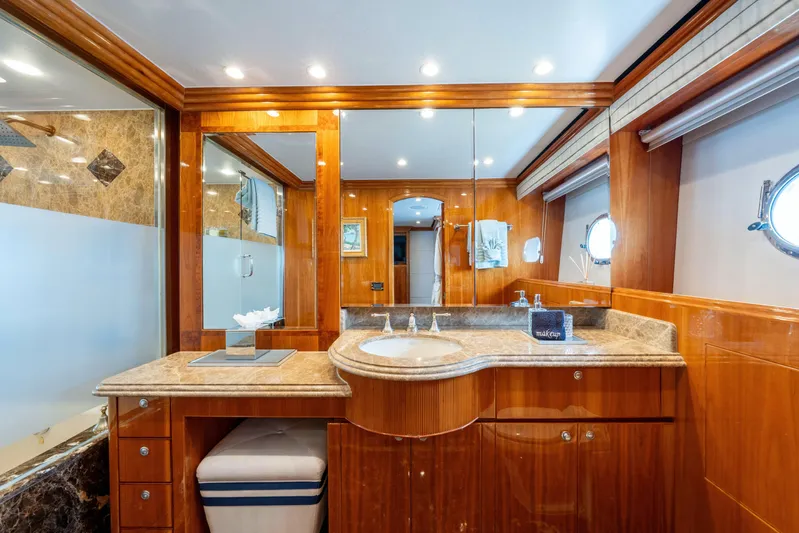  Yacht Photos Pics Luxurious bathroom in 2009 Hargrave Raised Pilothouse yacht with elegant wood and marble finishes.