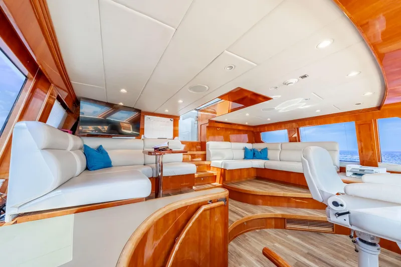  Yacht Photos Pics Luxurious 2009 Hargrave Raised Pilothouse yacht interior with plush seating and elegant wood finishes.