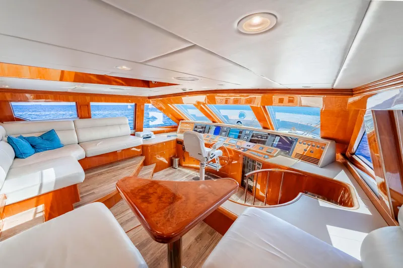  Yacht Photos Pics Luxurious 2009 Hargrave Raised Pilothouse yacht interior with plush seating and panoramic ocean views.