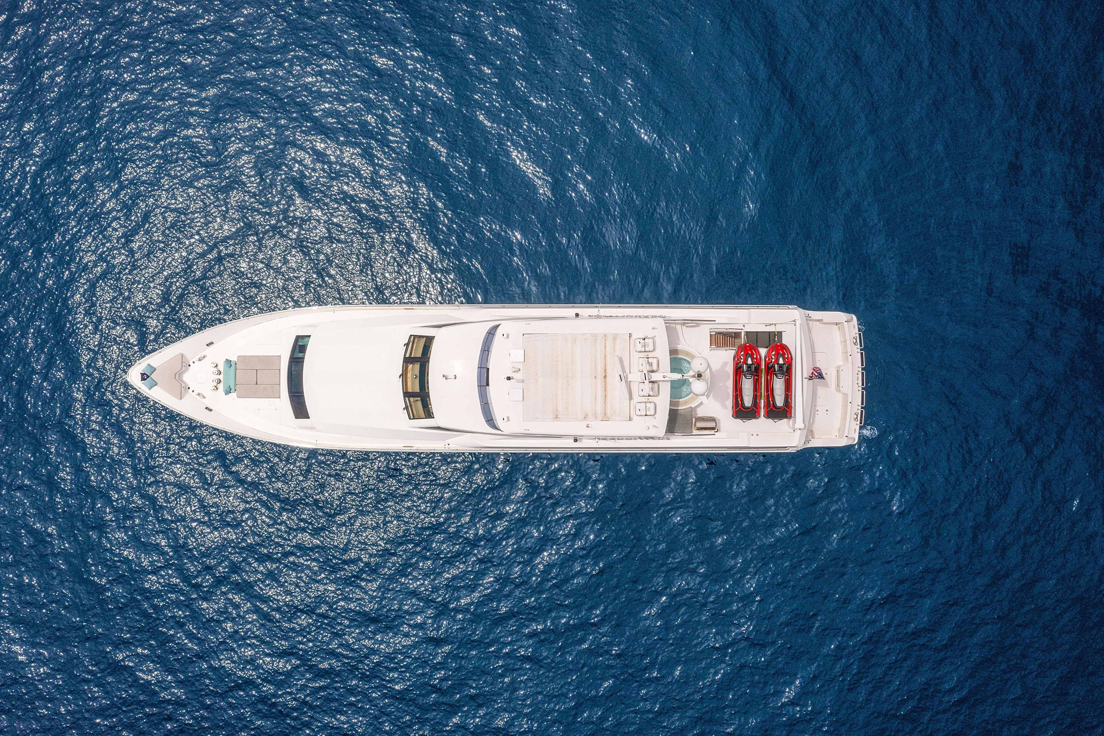  Yacht Photos Pics Aerial view of 2009 Hargrave Raised Pilothouse yacht on blue ocean water.