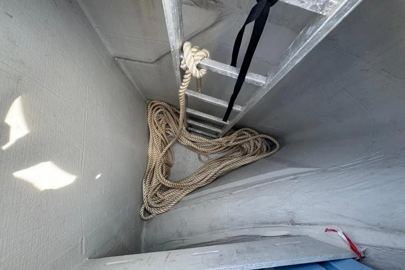 November Xiii Yacht Photos Pics Ladder and coiled rope in 2019 Fountaine Pajot MY 44 yacht compartment.