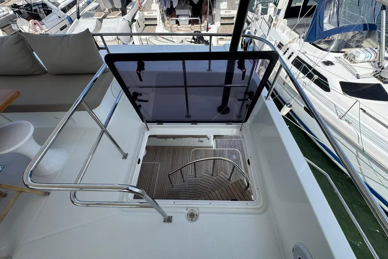 November Xiii Yacht Photos Pics 2019 Fountaine Pajot MY 44 yacht with open hatch and sleek deck design.