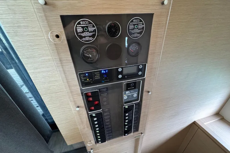 November Xiii Yacht Photos Pics Control panel of 2019 Fountaine Pajot MY 44 yacht, featuring various gauges and switches.
