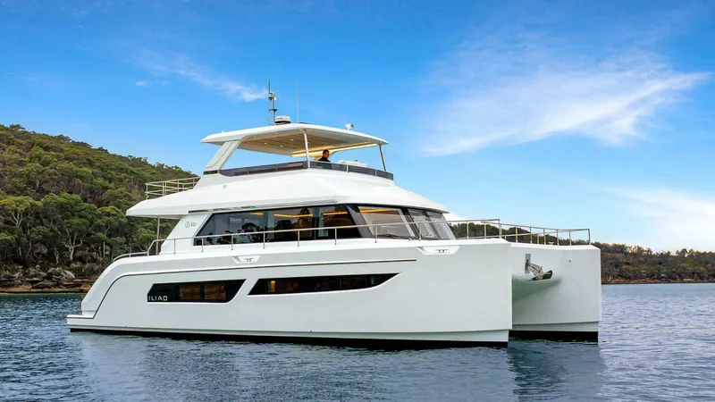 53f Iliad 2026 Yacht Photos Pics Luxury ILIAD 53F catamaran yacht on serene water, 2026 model.