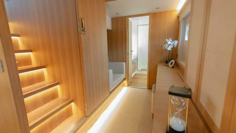 53f Iliad 2026 Yacht Photos Pics Luxurious interior of 2026 ILIAD 53F yacht with wooden finishes and modern decor.