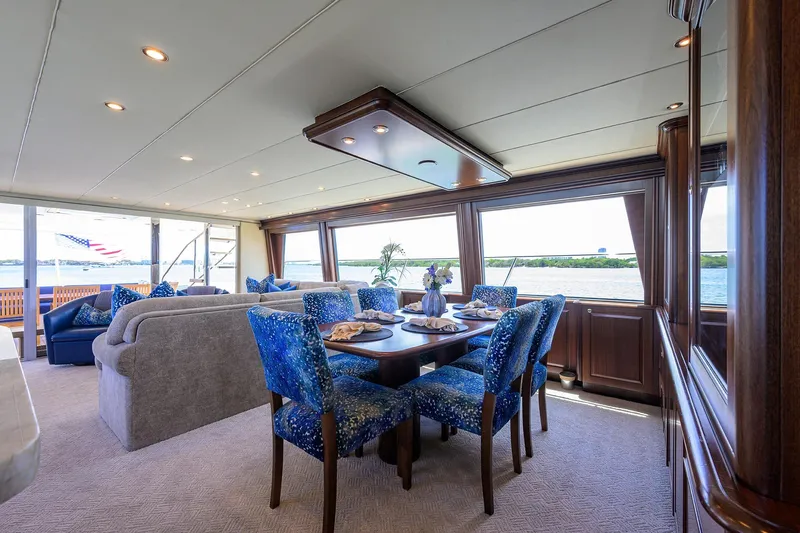 Jule Yacht Photos Pics Luxurious interior of 2005 Pacific Mariner 85 yacht with elegant dining area and ocean view.