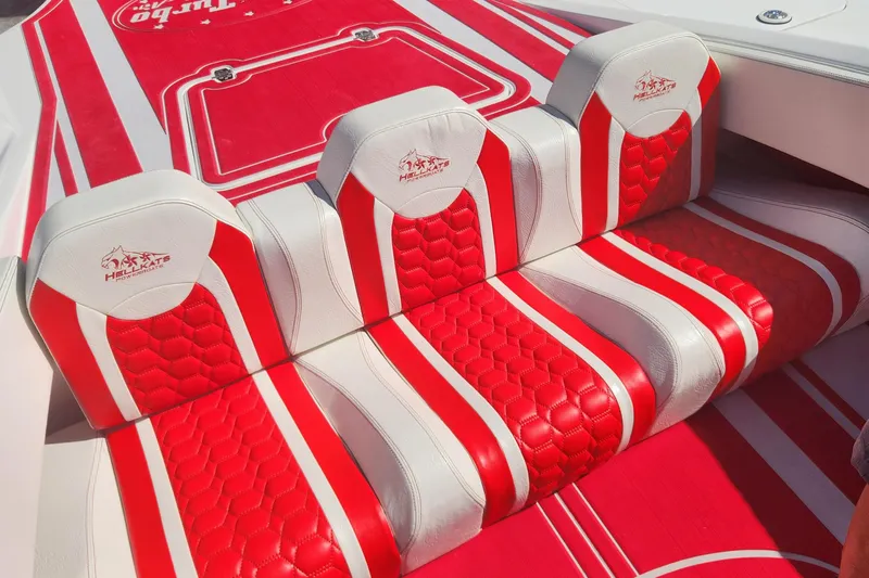  Yacht Photos Pics Red and white seating in 2022 HellCat 32 Wide Body boat.