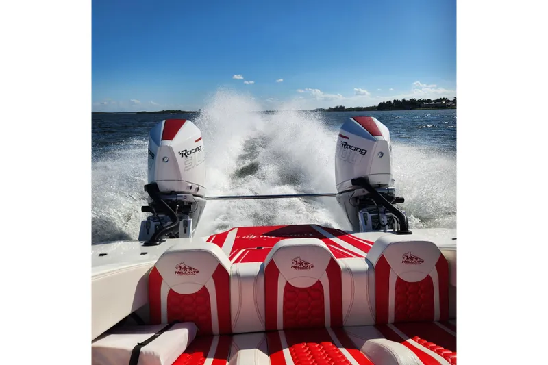  Yacht Photos Pics 2022 HellCat 32 Wide Body boat with dual racing engines on open water.
