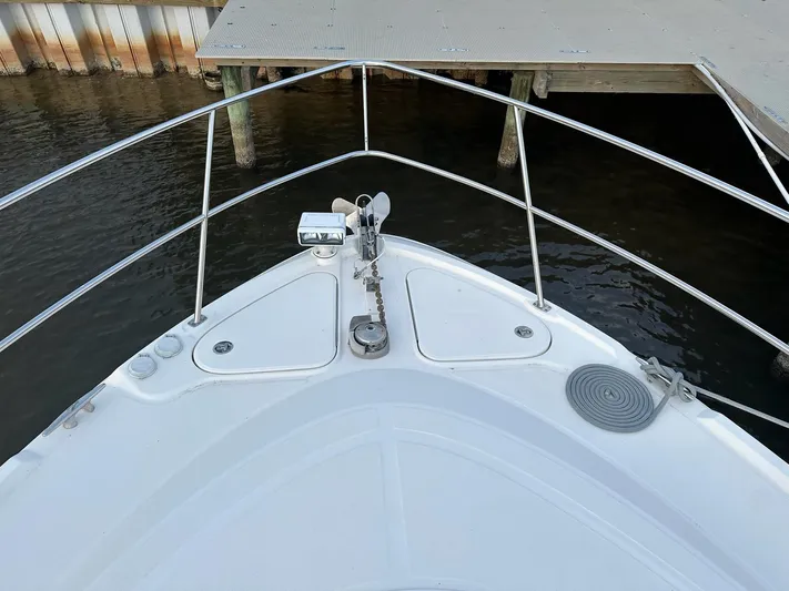 Be A Blessing II Yacht Photos Pics Bow of 2009 Sea Ray 4300 Sundancer yacht docked at marina.
