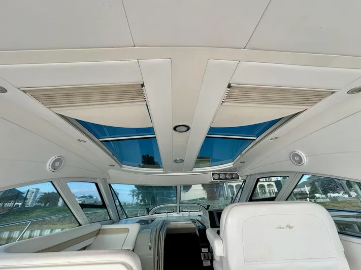 Be A Blessing II Yacht Photos Pics Interior view of 2009 Sea Ray 4300 Sundancer yacht with sunroof and seating.