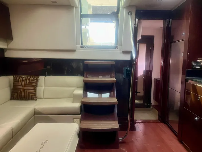 Be A Blessing II Yacht Photos Pics Luxurious interior of 2009 Sea Ray 4300 Sundancer yacht with elegant staircase and seating.