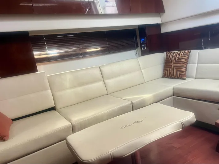 Be A Blessing II Yacht Photos Pics Luxurious interior of 2009 Sea Ray 4300 Sundancer yacht with cream leather seating.