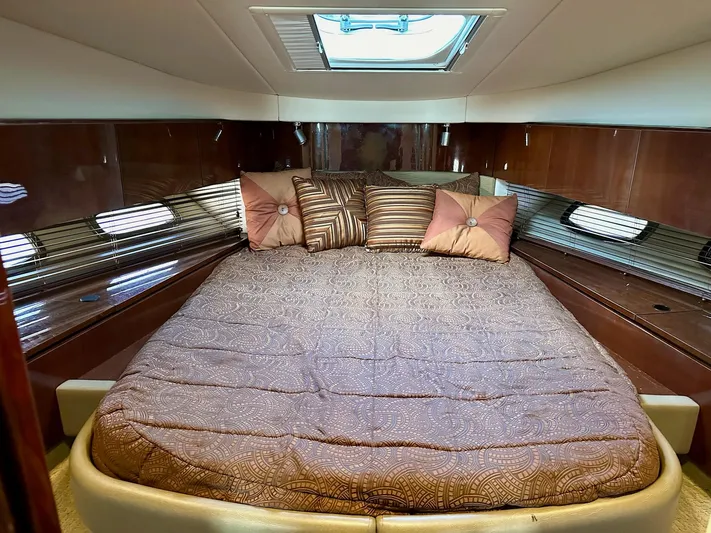 Be A Blessing II Yacht Photos Pics Luxurious cabin interior of 2009 Sea Ray 4300 Sundancer with plush bedding and elegant decor.