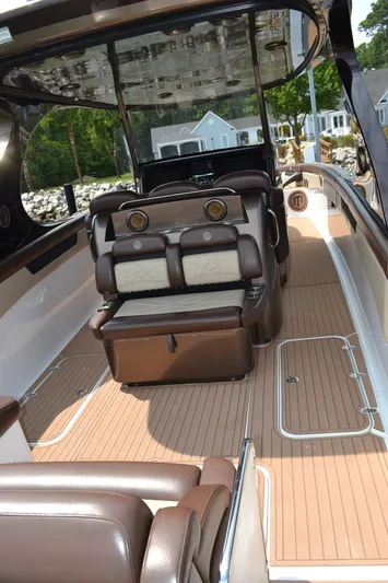  Yacht Photos Pics 2016 Mystic Powerboats M4200 interior with luxurious seating and sleek design.