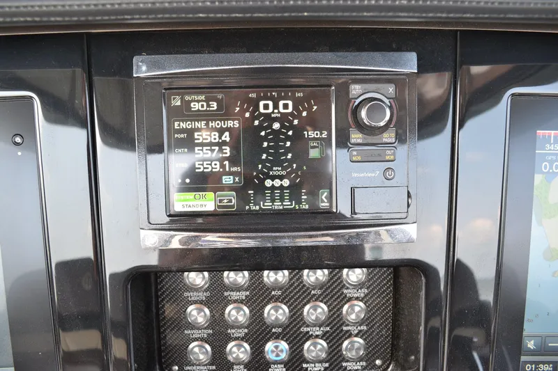  Yacht Photos Pics Dashboard of 2016 Mystic Powerboats M4200 showing engine hours and controls.