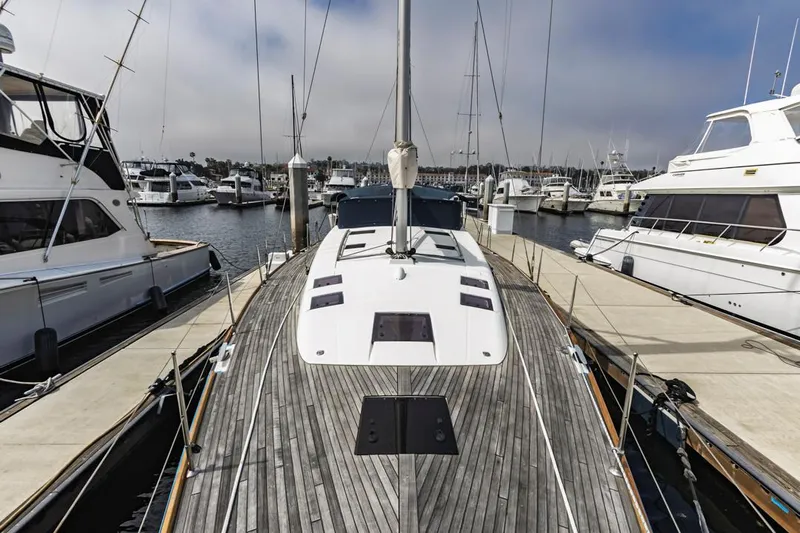 Blue Sky Yacht Photos Pics 2012 Beneteau Sense 50 yacht docked at a marina, showcasing sleek deck design.