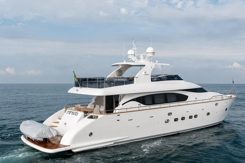  Yacht Photos Pics Luxurious 2015 Maiora 24S yacht cruising on open sea under clear skies.