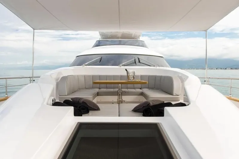  Yacht Photos Pics Luxurious 2015 Maiora 24S yacht deck with elegant seating and ocean view.