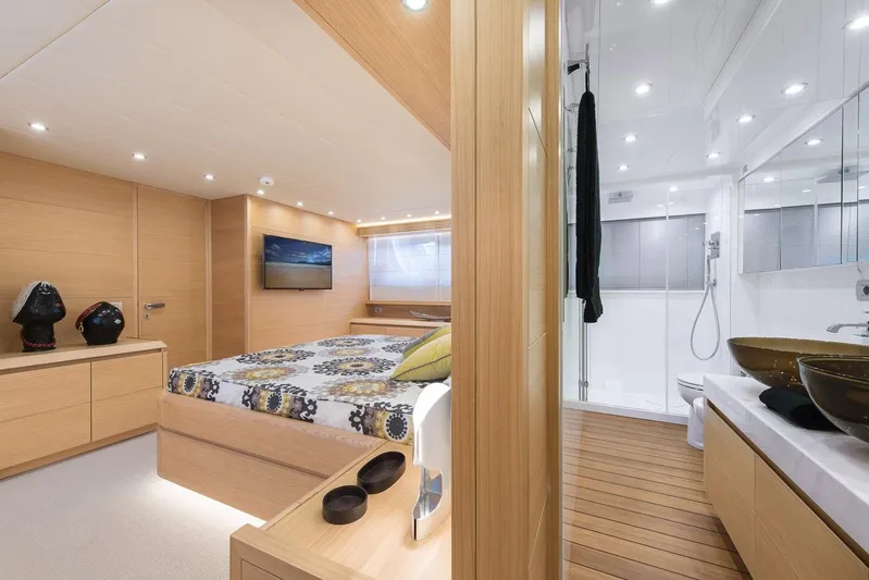  Yacht Photos Pics Luxurious Maiora 24S 2015 yacht interior with modern bedroom and elegant bathroom.