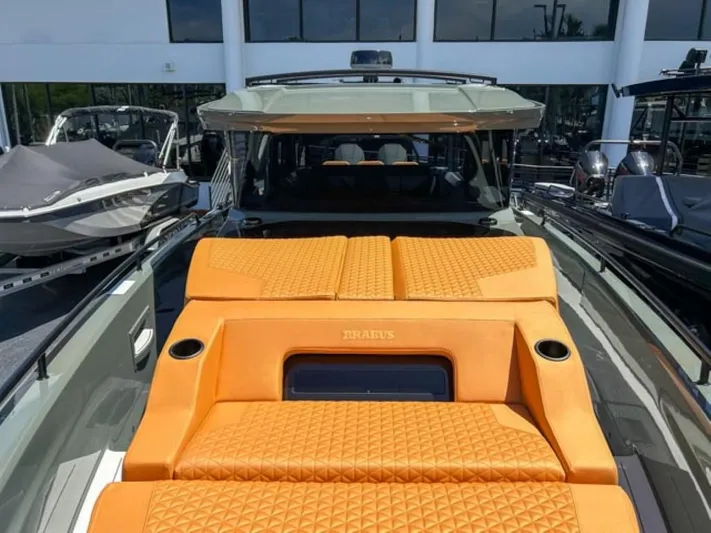  Yacht Photos Pics 2024 BRABUS Shadow 1000XC luxury yacht with orange quilted seating.