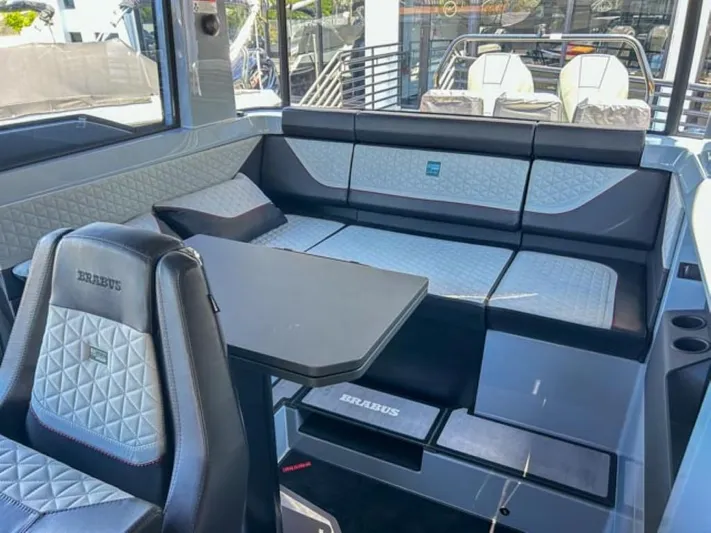  Yacht Photos Pics 2024 BRABUS Shadow 1000XC luxury boat interior with quilted seating and sleek design.