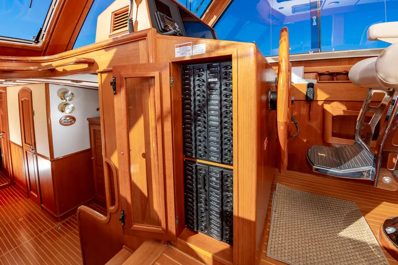 I Freedom I Yacht Photos Pics Interior of 2005 Grand Banks 49 Eastbay SX with wood paneling.
