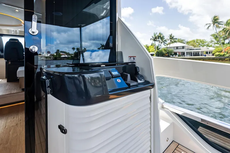 Lobster Tails Yacht Photos Pics Luxury yacht Absolute 52 FLY 2023, featuring sleek design and modern amenities, docked by water.