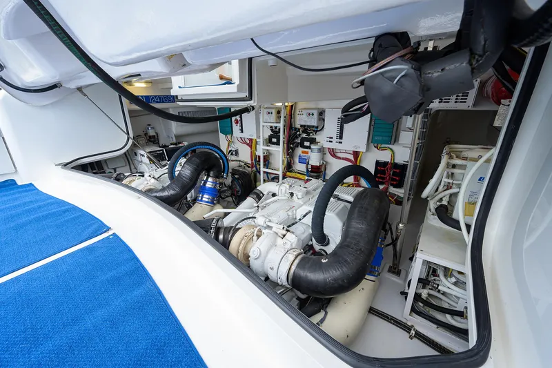 Galene Yacht Photos Pics Engine room of 2013 Viking 42 Open yacht, showcasing mechanical components and systems.