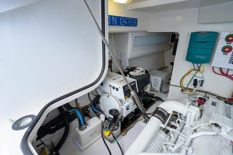 Galene Yacht Photos Pics Engine room of 2013 Viking 42 Open yacht, showcasing equipment and wiring.