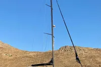 Sailing yacht Solaris 50, 2019 model, anchored in calm waters with clear blue sky.