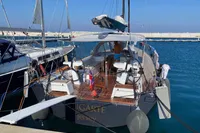 Sailing yacht Solaris 50, 2019 model, docked at marina with clear blue water.