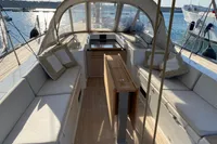 Luxurious 2019 Solaris 50 yacht interior with elegant seating and wooden table.
