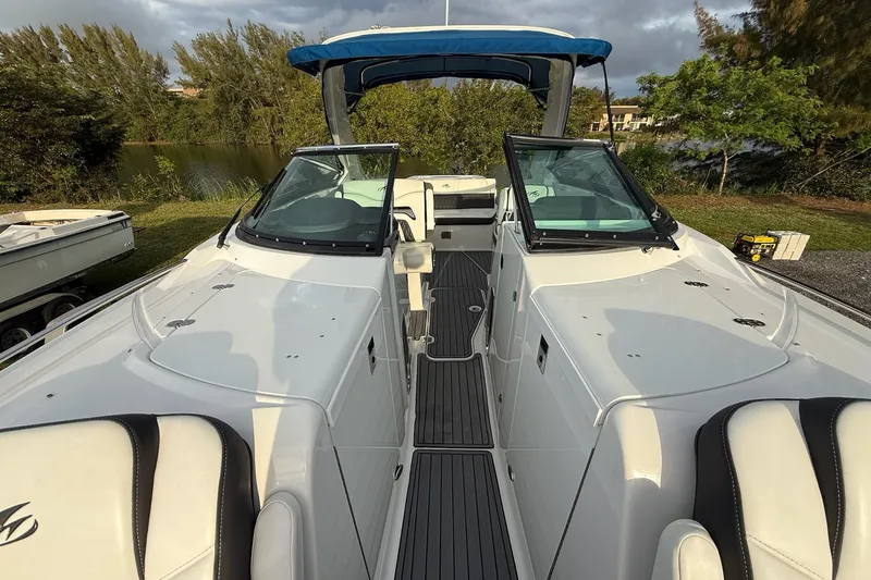  Yacht Photos Pics 2019 Monterey 328SS Super Sport boat with sleek white interior and dual windshields.