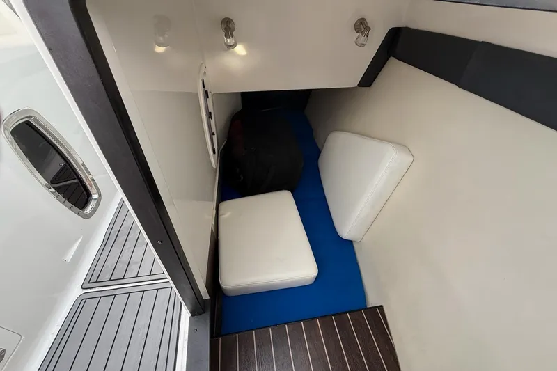  Yacht Photos Pics Interior cabin of 2019 Monterey 328SS Super Sport boat with cushions and lighting.