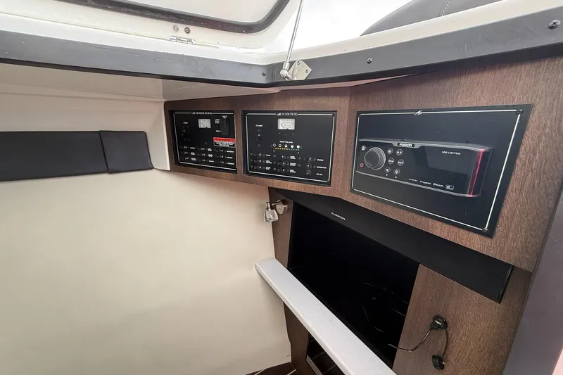  Yacht Photos Pics Control panel of a 2019 Monterey 328SS Super Sport boat interior.