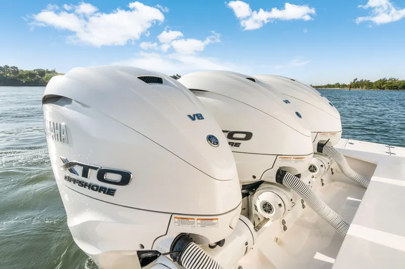 Our Trade Yacht Photos Pics 2024 Regal 42 XO boat with Yamaha XTO Offshore engines on water.