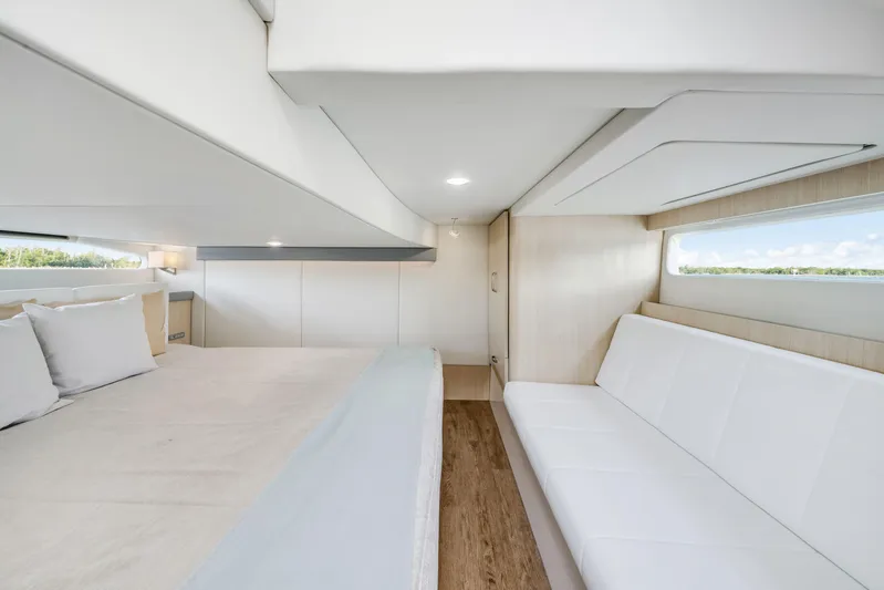 Our Trade Yacht Photos Pics Luxurious interior of 2024 Regal 42 XO yacht with modern furnishings and natural light.