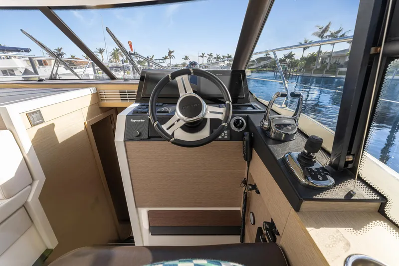 Next Waypoint Yacht Photos Pics Prestige 420 Flybridge 2020 yacht helm with modern controls and panoramic view.