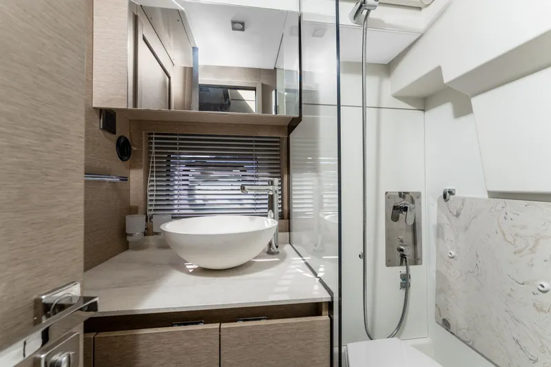 Next Waypoint Yacht Photos Pics Luxurious bathroom in 2020 Prestige 420 Flybridge yacht with modern fixtures and elegant design.