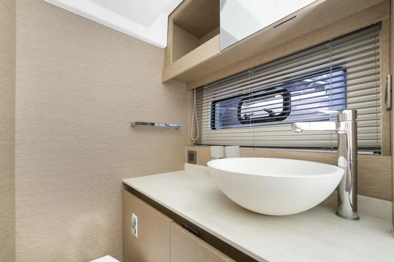 Next Waypoint Yacht Photos Pics Modern bathroom in 2020 Prestige 420 Flybridge yacht with sleek design and vessel sink.