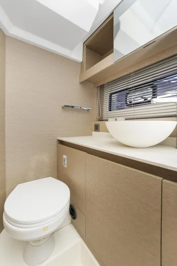 Next Waypoint Yacht Photos Pics Modern bathroom in 2020 Prestige 420 Flybridge yacht with sleek design and vessel sink.