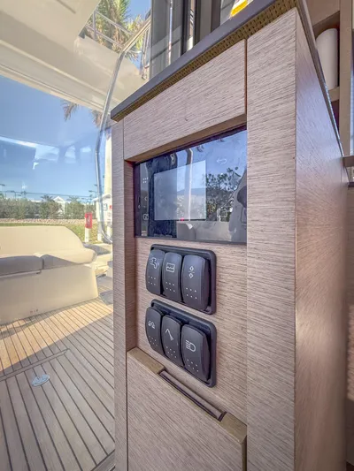 Next Waypoint Yacht Photos Pics Control panel on 2020 Prestige 420 Flybridge yacht, featuring modern design and functionality.