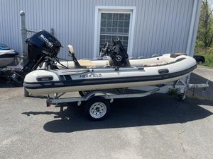 2023 Highfield Classic 380 GT Limited boat on trailer, featuring Suzuki outboard motor.