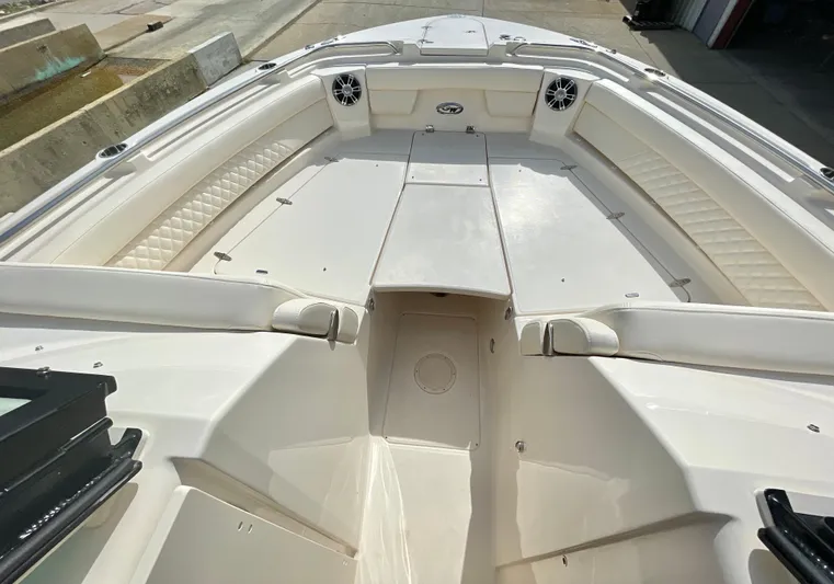  Yacht Photos Pics 2025 Grady-White Freedom 325 boat interior with spacious seating and sleek design.